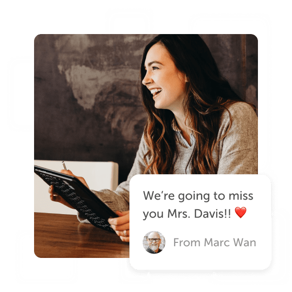 Smiling teacher with tablet and a 